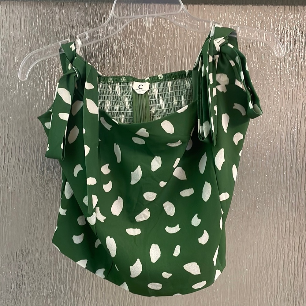 Green polka dot tie shirt. Zipper in back